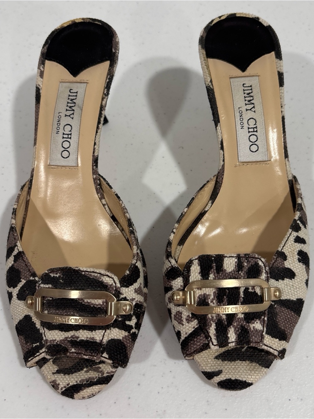 Jimmy Choo Leopard-Print Open-Toe Mules with Gold Hardware. Wear on bottom